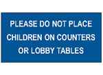 PLEASE DO NOT PLACE CHILDREN ON COUNTERS OR LOBBY TABLES sign